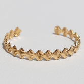 Armband bangle schelp goud