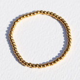 Armband gouden ballen medium