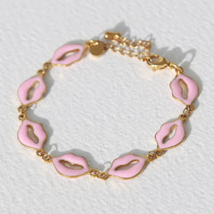 Pulsera labios rosa oro
