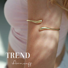 Manchette de bras goutte dorée