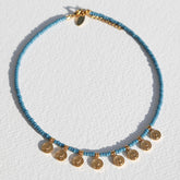 Ketting Miyuki gouden muntjes blauw