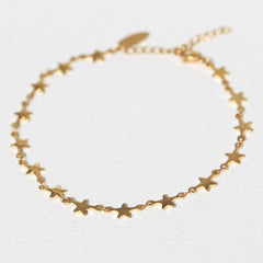 Golden anklet with stars