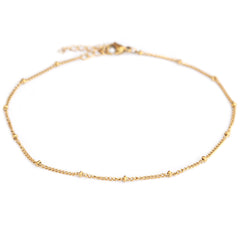 Pulsera de tobillo con puntos dorados
