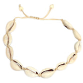 Tobillera con conchas