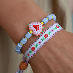 Geweven armband cotton flower lila