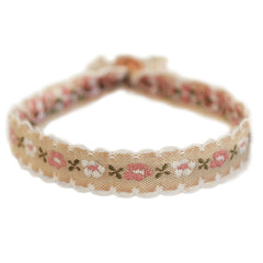 Pulsera tejida flor de algodón beige