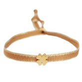 Pulsera tejida trébol dorado