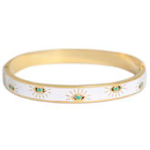 Gold bangle evil eye