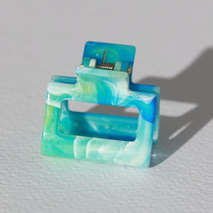 Remolino de pinza de pelo oceano pequeño