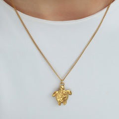 Gouden ketting met schildpad