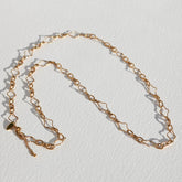 Long gold clover necklace