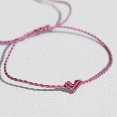 Bracelet petit cœur magenta