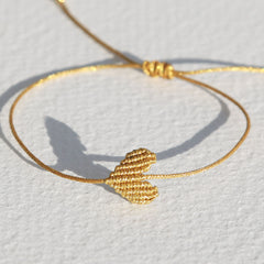 Brazalete corazón dorado