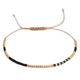 Miyuki bracelet black gold