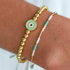 Brazalete mal de ojo oro menta