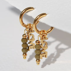Goldene Ohrringe facettiert Liebes oliven