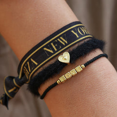 Pulsera negra esponjosa