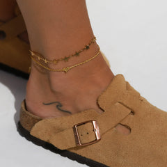 Golden anklet with stars