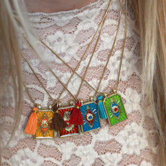 Gold necklace tableau blue