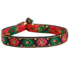 Pulsera tejida flor negra