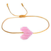 Brazalete corazón rosa bebé