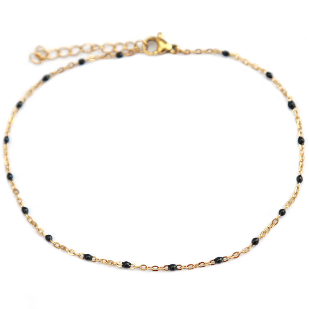 Pulsera de tobillo con pequeños lunares negros