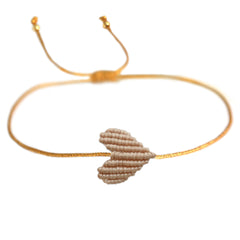 Brazalete corazón beige