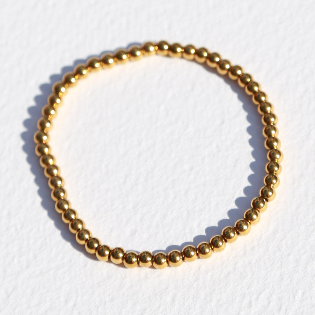 Armband gouden ballen medium
