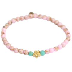Brazalete flor piedra rosa oro