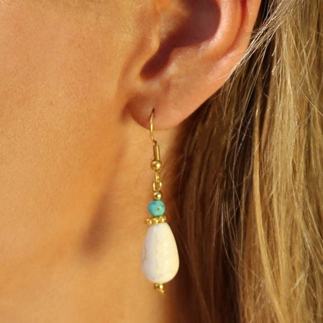 Pendientes colgantes de color crema