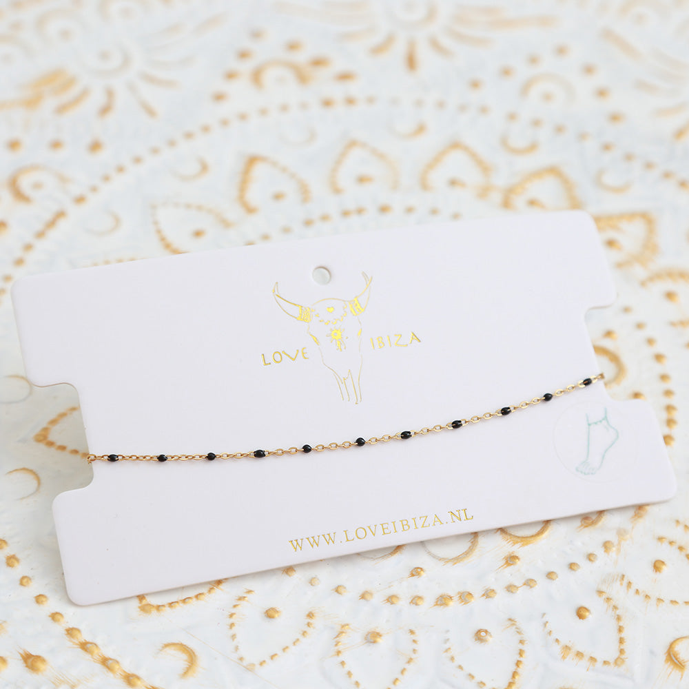 Pulsera de tobillo con pequeños lunares negros
