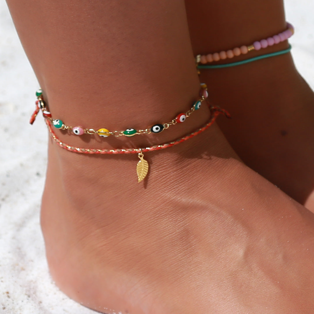 Pulsera de tobillo con ojo malvado dorado