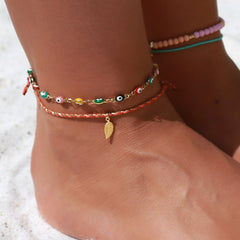 Pulsera de tobillo con ojo malvado dorado