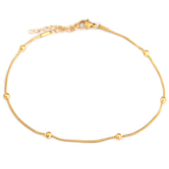 Bracelet de cheville boules dorées