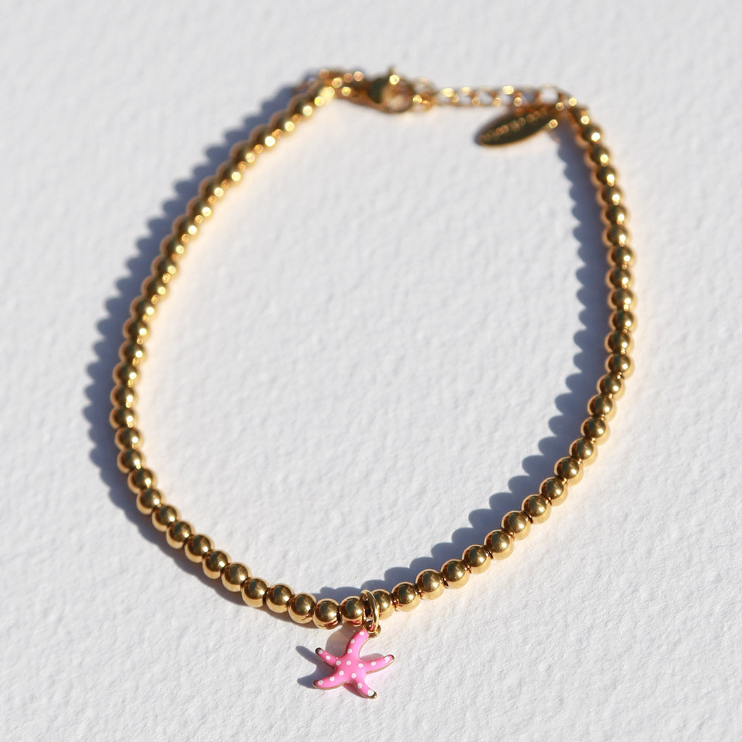 Gouden enkelbandje zeester roze