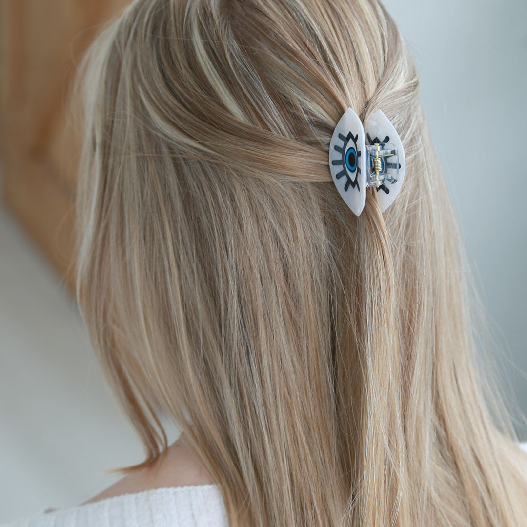 Pince à cheveux mauvais œil nacre noire