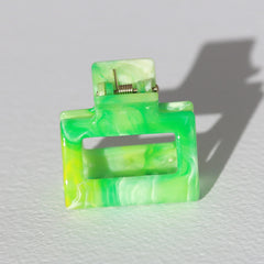 Remolino de pinza de pelo verde pequeño