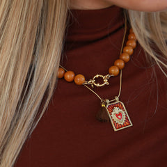 Collar de oro tabla de coñac