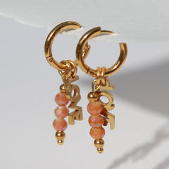 Goldene Ohrringe facettiert Liebe Orange