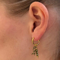 Goldene Ohrringe facettiert Liebes oliven
