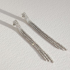 Mit Diamanten besetzte Goldohrringe