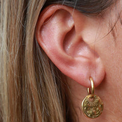 Gold earrings sun, moon and stars