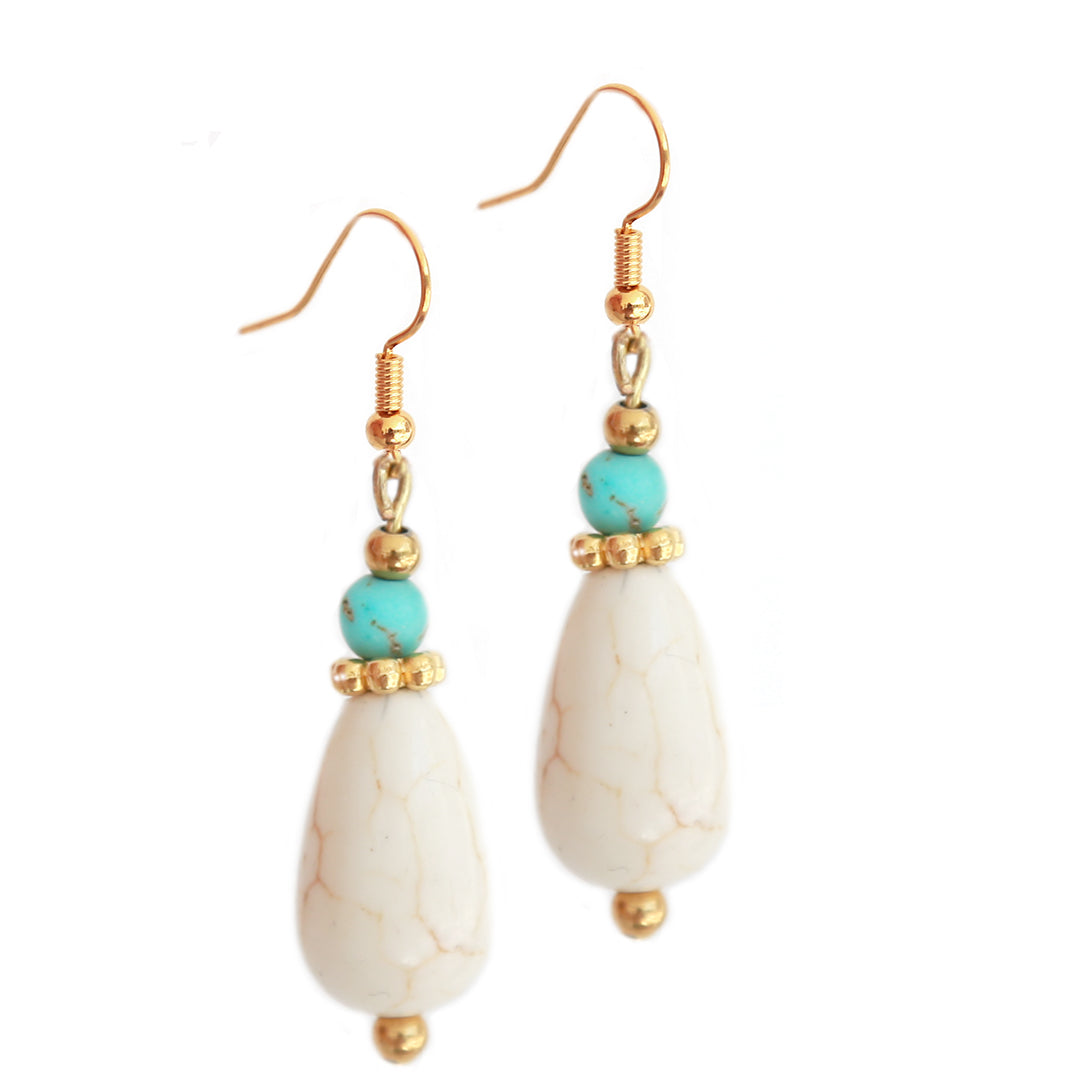Pendientes colgantes de color crema