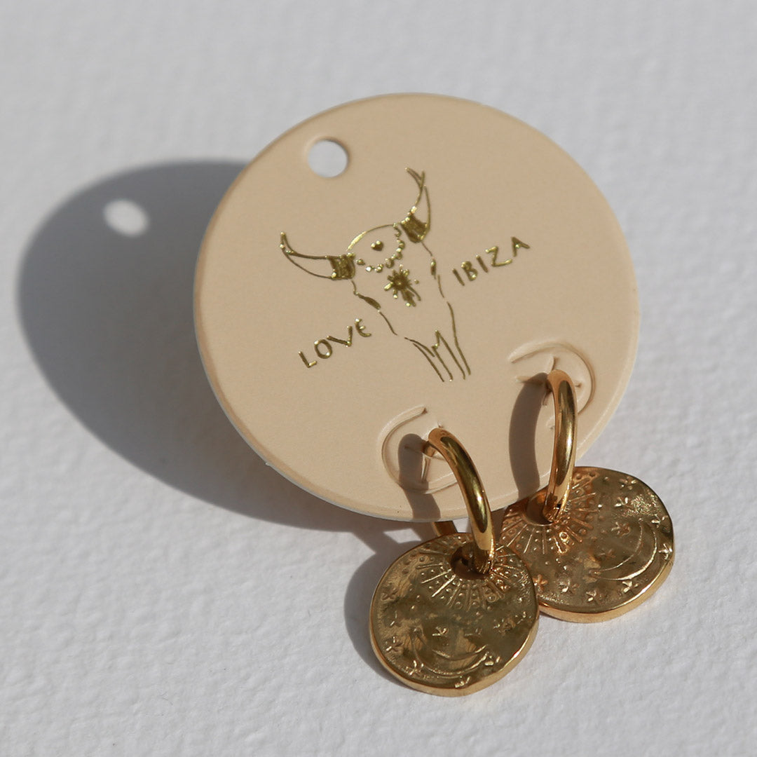 Gold earrings sun, moon and stars