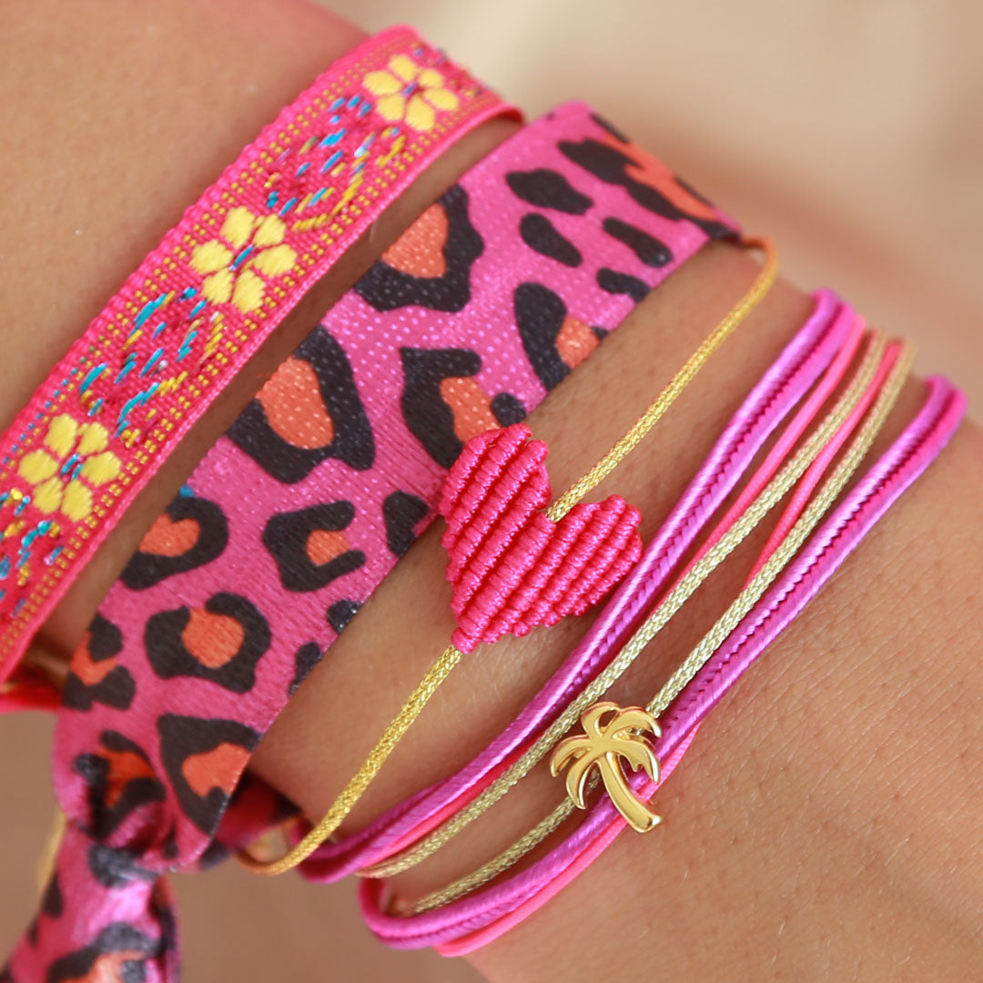 Pulsera tejida flor rosa amarilla