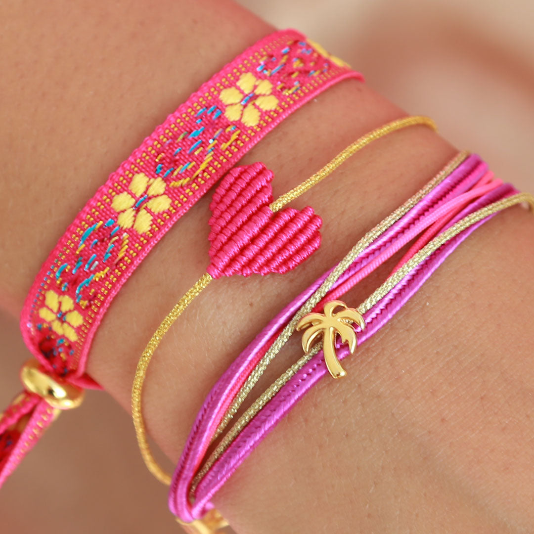 Pulsera tejida flor rosa amarilla