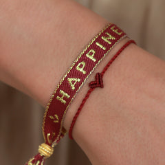 Pulsera tejida felicidad oro