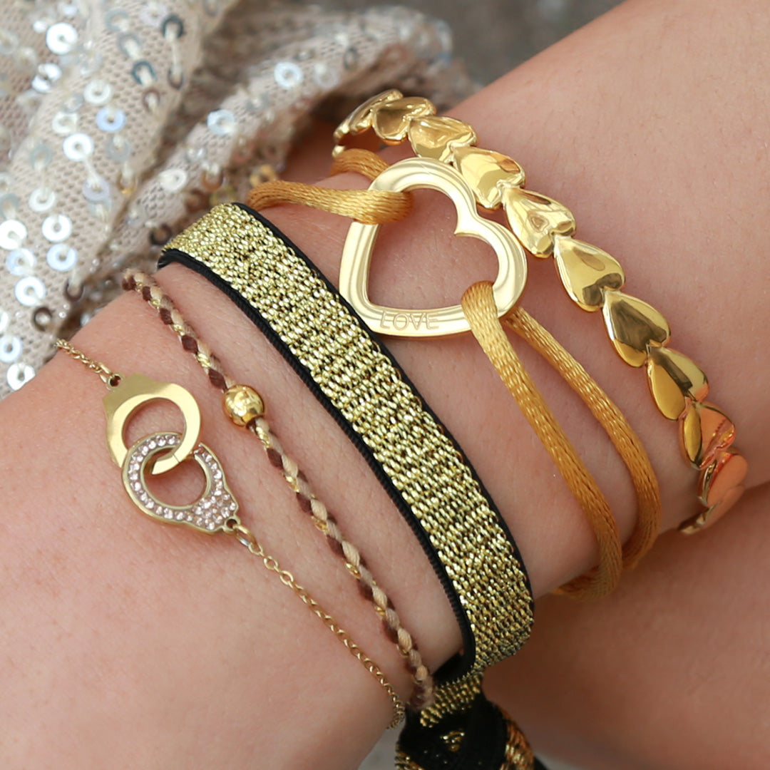 Goldene Armreifherzen