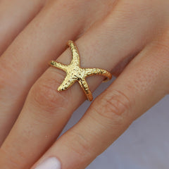 Anillo de estrella de mar de oro
