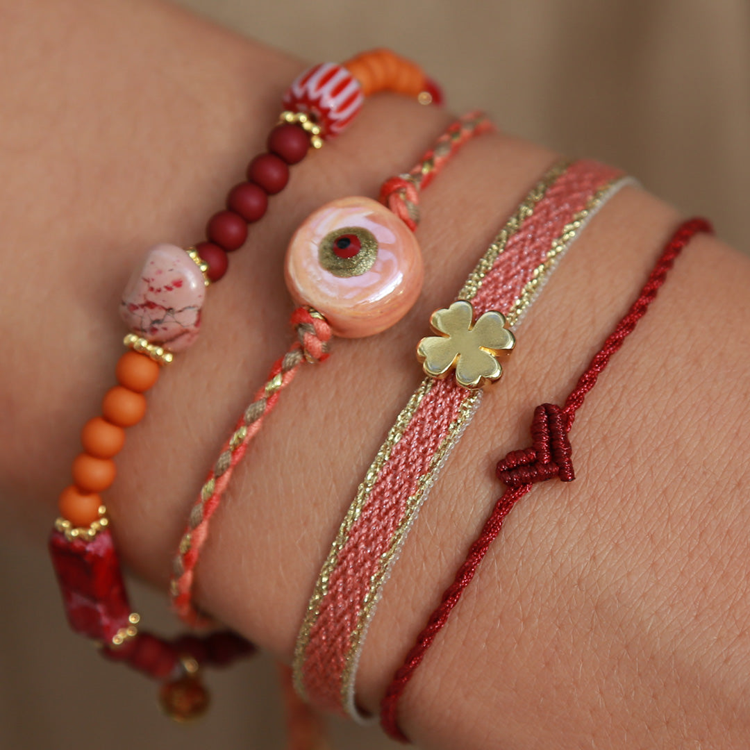 Pulsera tejida trébol ladrillo